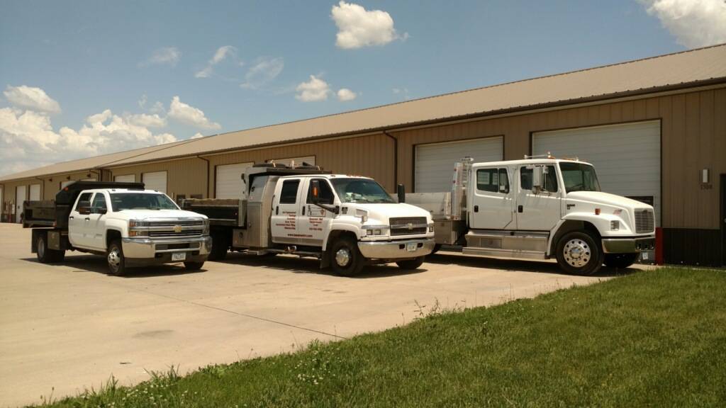 Three Basement RX trucks used during masonry projects.